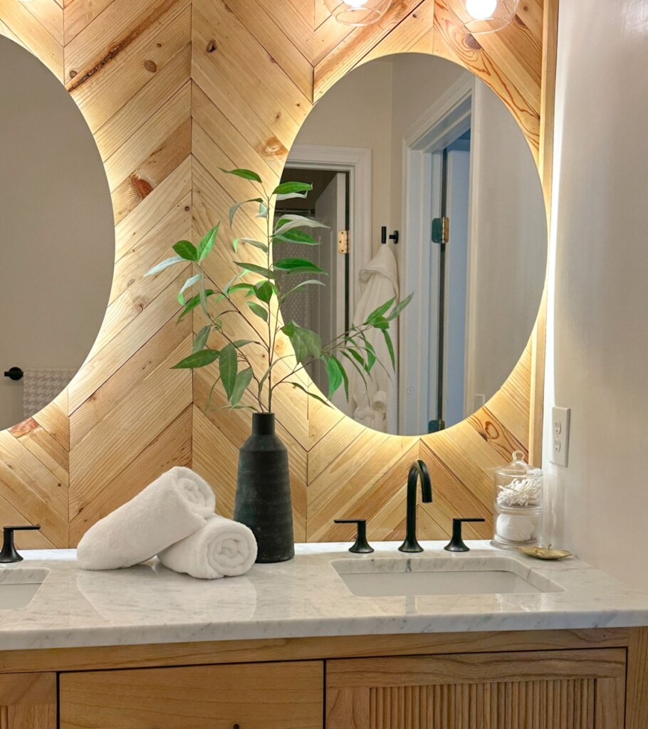 Bathroom vanity with lighted mirror