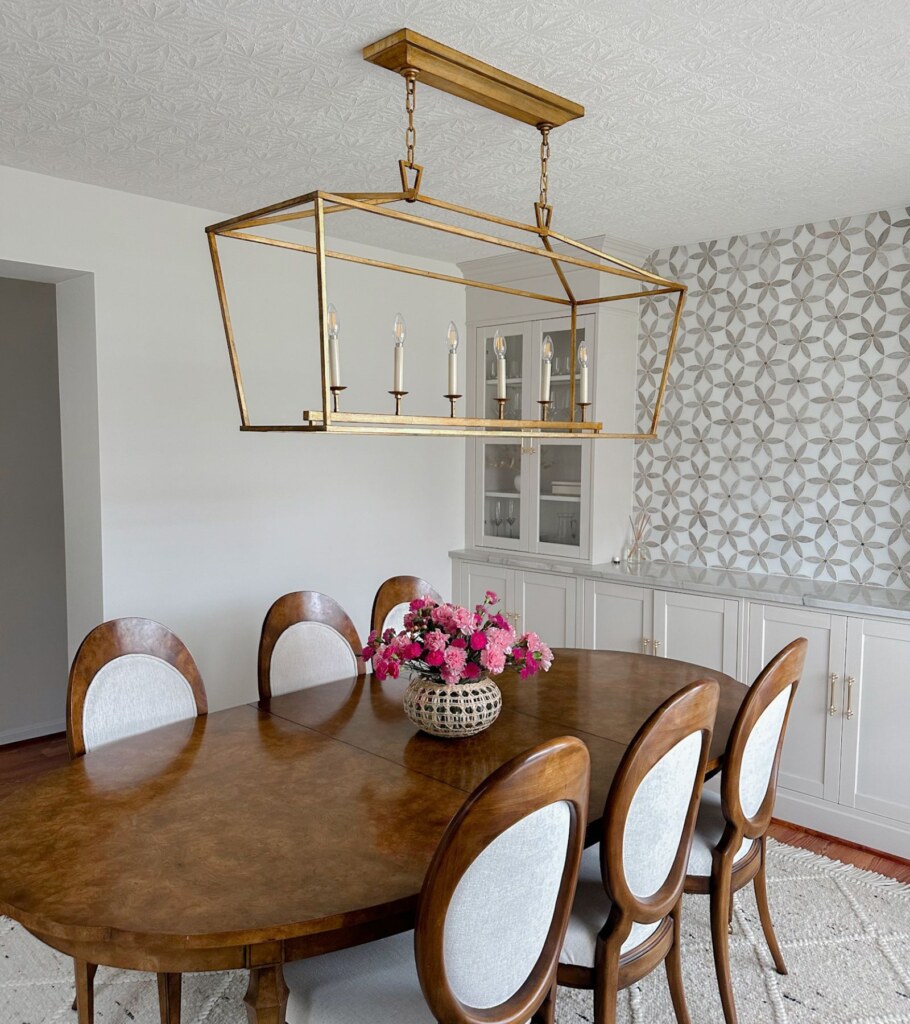 How high to hang a chandelier over dining table with 11 foot ceilings