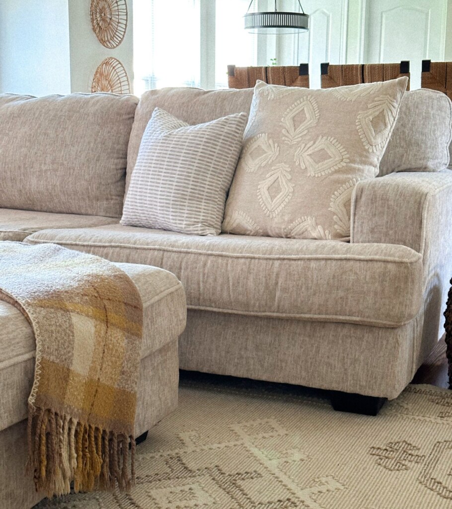 how to place a throw blanket on a sofa