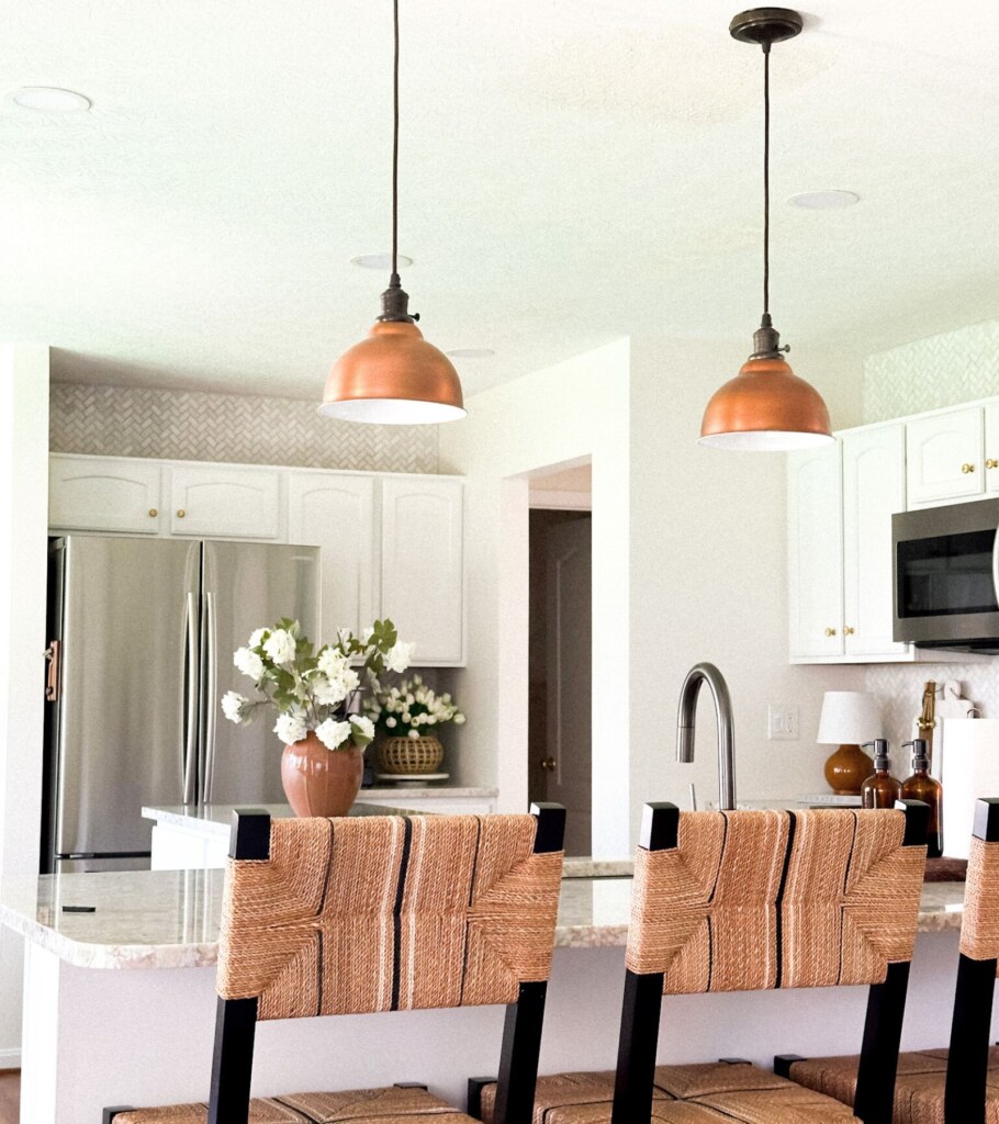 Kitchens with white cabinets and white countertops