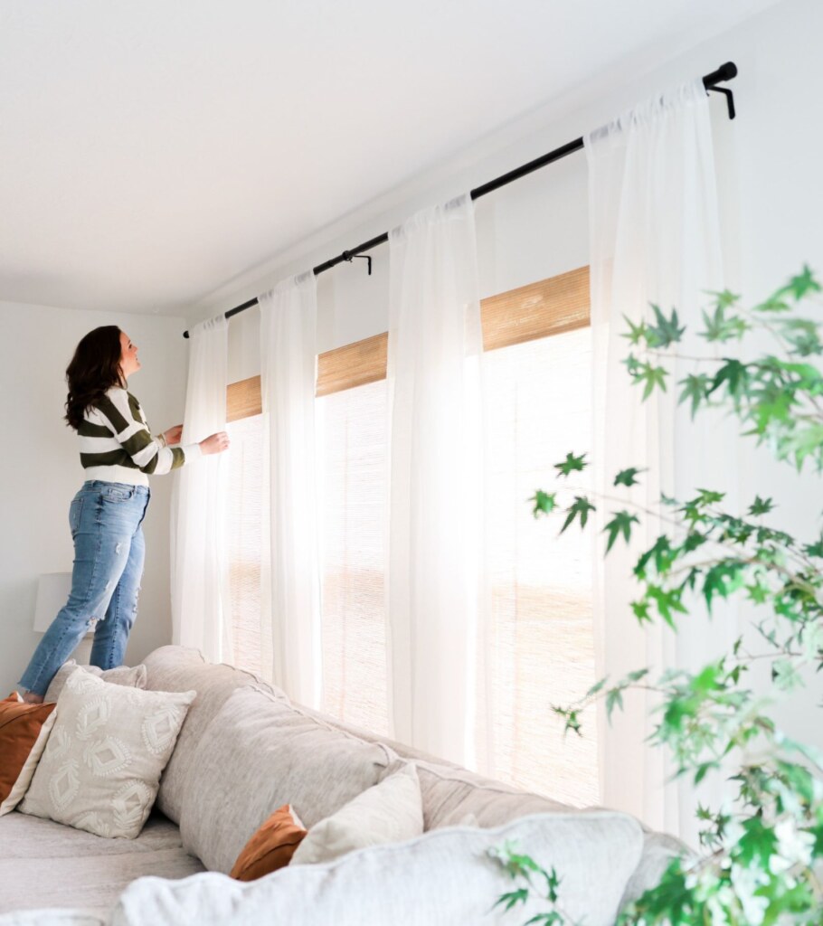 how high to hang curtains over window